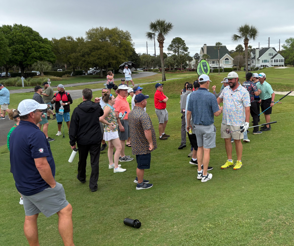 Spectators watching the final holes on the 18th green during the Lowcountry Open at Old South Golf Links