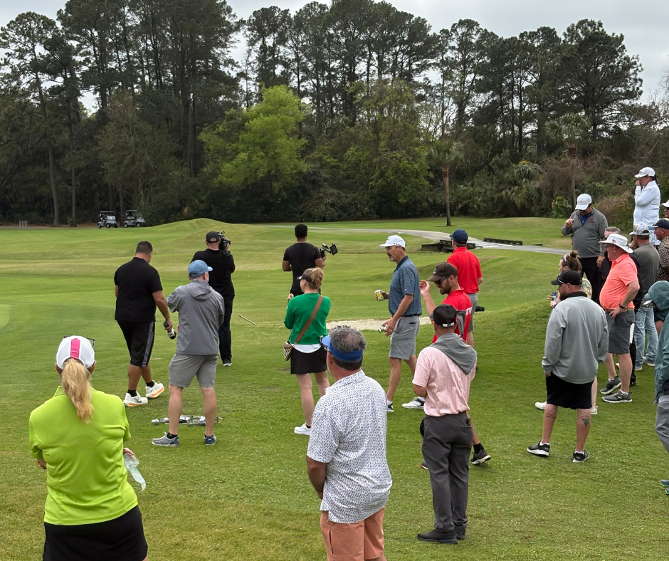 Spectators watching the final holes on the 18th green during the Lowcountry Open at Old South Golf Links