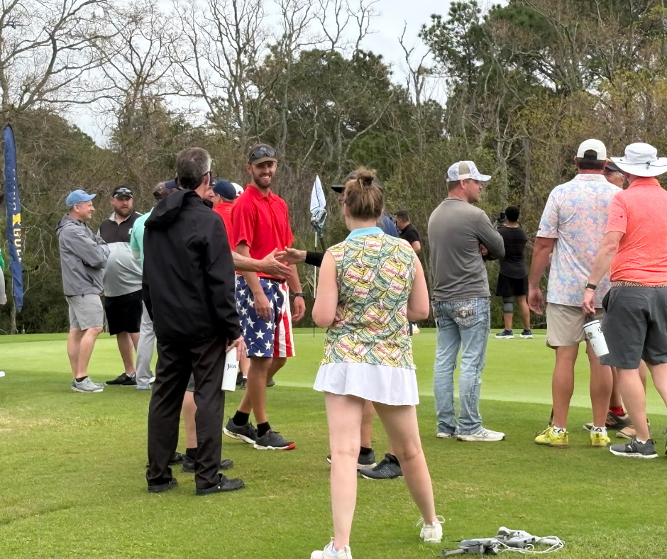 Spectators watching the final holes on the 18th green during the Lowcountry Open at Old South Golf Links