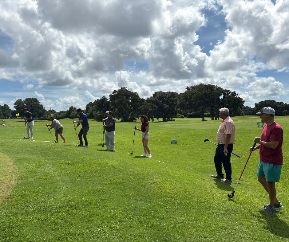 Group learning the FlingGolf side car technique around the green at Old South Golf Links near Hilton Head Island.